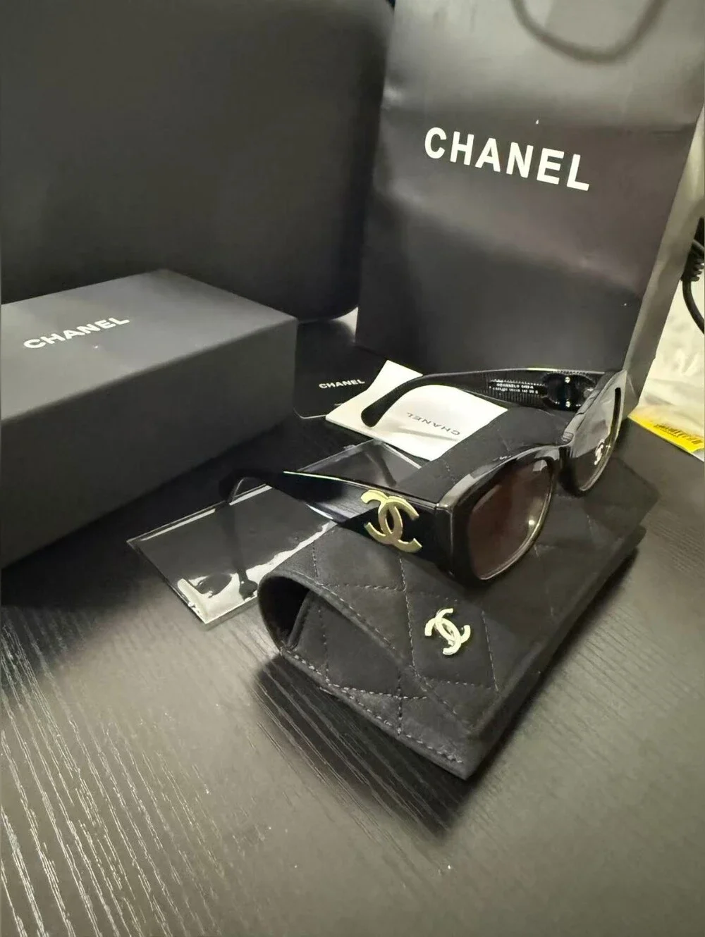 CHANEL Black Frame Sunglasses with Brown Gradient Lenses